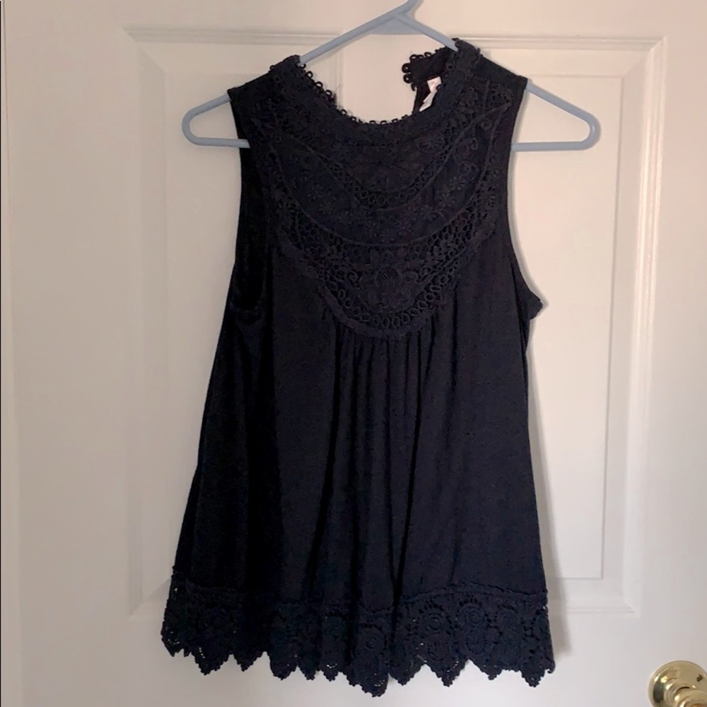 High neck blue sleeveless shirt